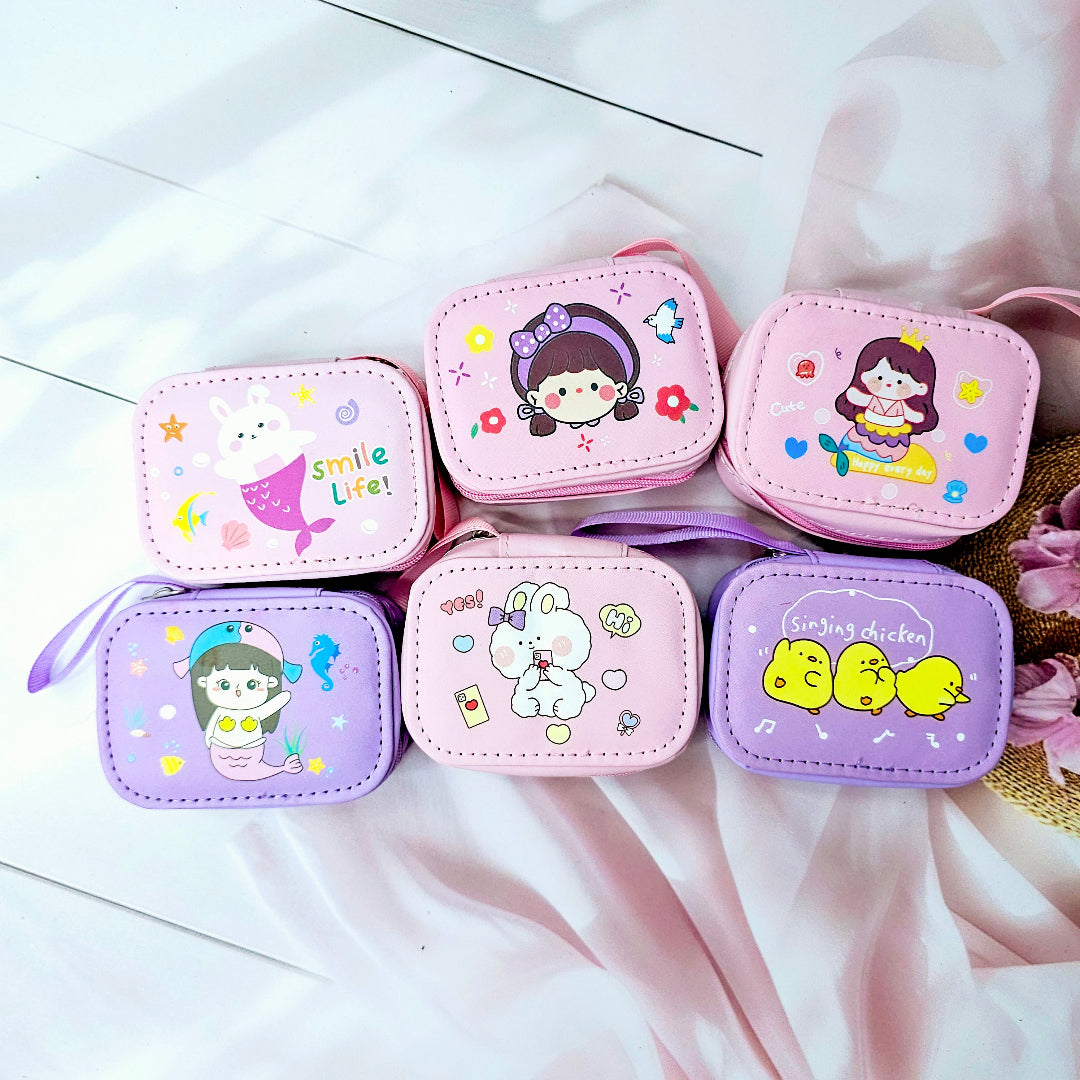 Various cartoon-themed small storage pouches for kids, featuring bunnies, chicks, and other fun designs. www.usmile.toys